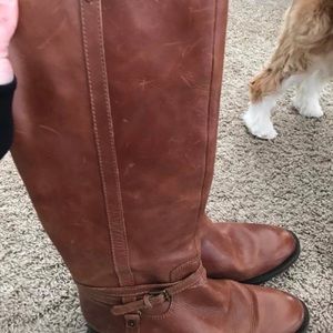 Size 10 boots tall distressed wore twice.